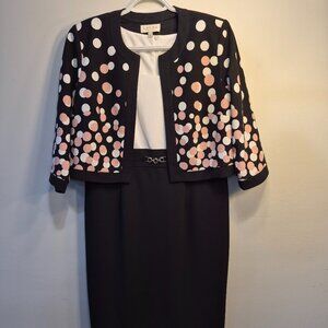 Laura outfit. Black and white sleevlees dress with open front blazer